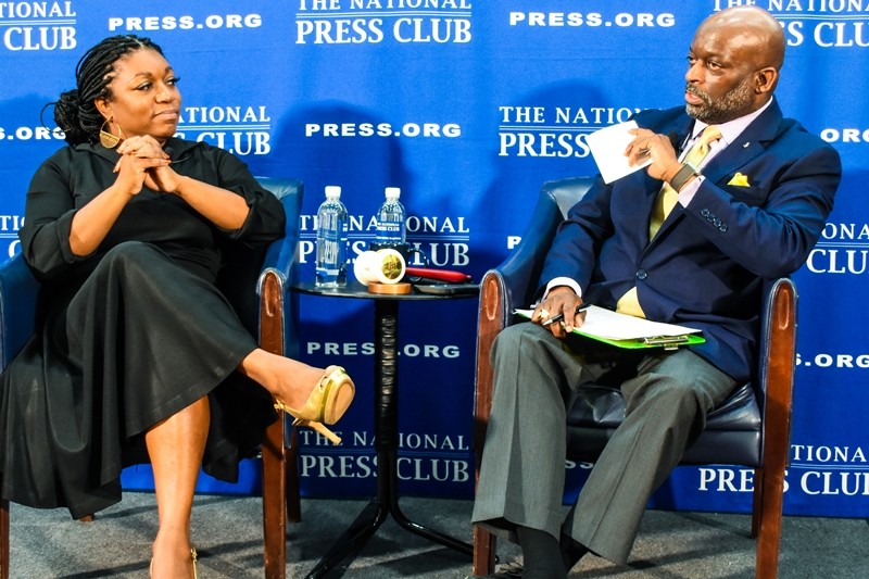 Photo of author Deesha Dyer and former National Press Club President Jeffrey Ballou