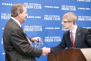 Don L. Blankenship, chairman and chief executive officer of Massey Energy Company, accepts the traditional NPC coffee mug from president, Alan Bjerga at a July 22, 2010 National Press Club...