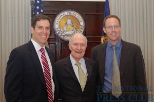Gerald Ford Journalism Award Winners Ben Feller (Associated Press), left, and Greg Jaffe (Washington Post), right, are congratulated by awards luncheon keynote speaker Brent Scowcroft, former National Security Advisor to...