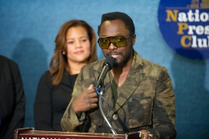 Artist Will.i.am addresses the media about green initiatives in the Club's Margaret Burke-White Room.