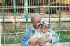 Jailed Ethiopian journalist Eskinder Nega, with his son, could receive the death penalty on May 11.