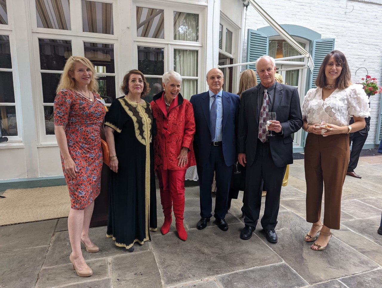 ICC member Kate Jones, Fatima Boutache, wife of the ambassador, ICC member Jan Du Plain, Ambassador Ahmed Boutache, ICC member Skip Kaltenheuser and Wafa Ameuri, political counselor for the Algerian Embassy at the Embassy Night at The Elms. ICC member Kate Jones, Fatima Boutache, wife of the ambassador, ICC member Jan Du Plain, Ambassador Ahmed Boutache, ICC member Skip Kaltenheuser and Wafa Ameuri, political counselor for the Algerian Embassy at the Embassy Night at The Elms.