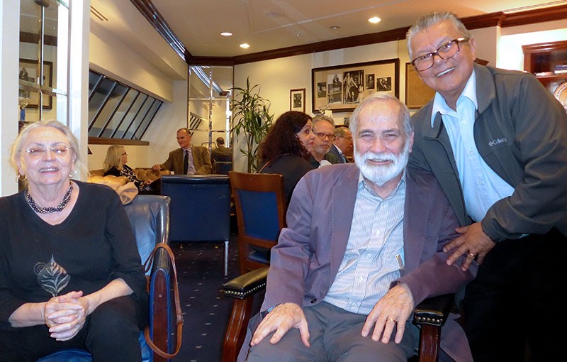 Jose Granados (right) poses next to historian and nonfiction author Nicholas (Nick) Reynolds and his wife Becky. Photo by Noël-Marie Fletcher. 