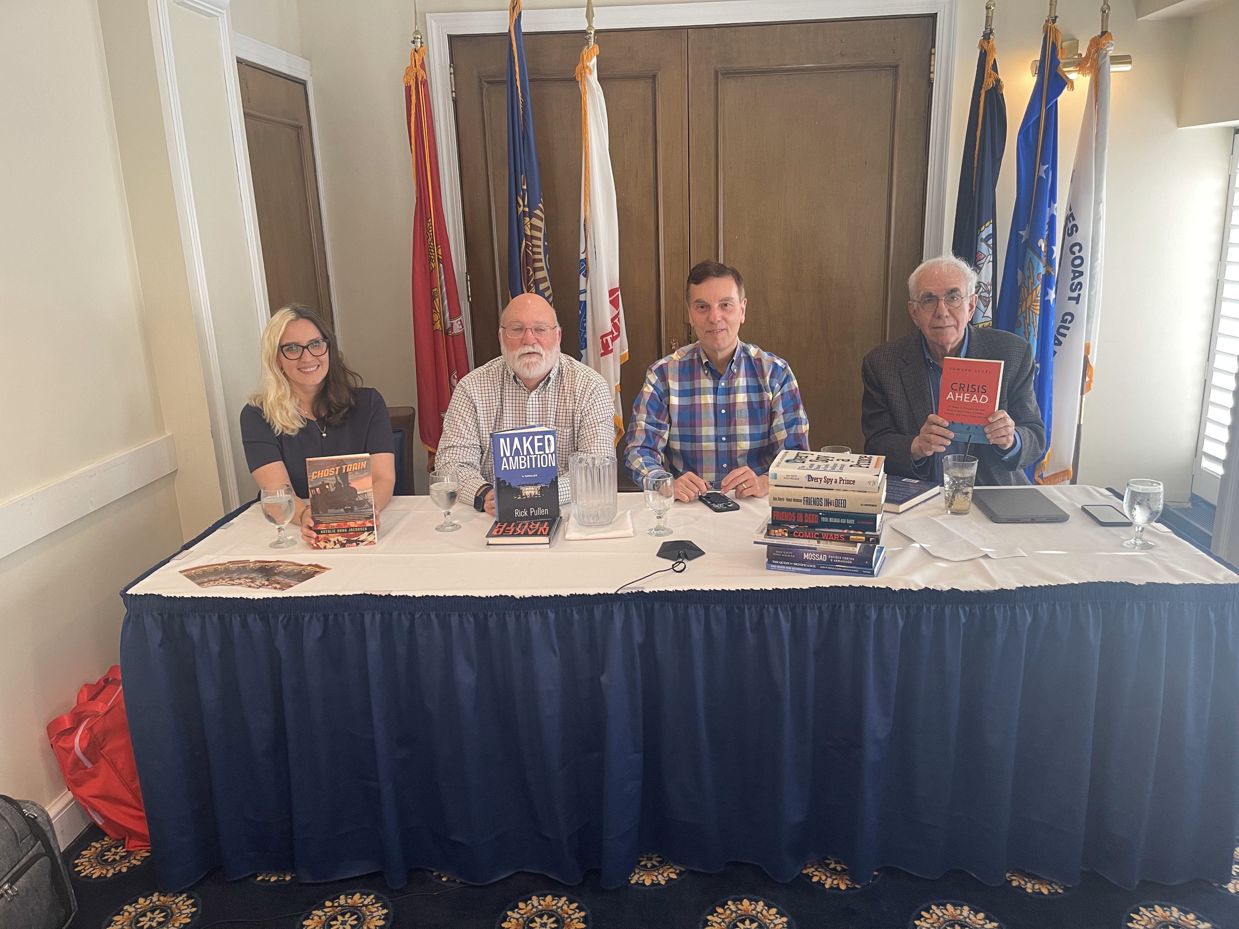 A panel of authors reviewed their publishing experiences at the inaugural Member-Author Team event on May 15, 2025. From left: Team Co-Lead Natalie Jacobsen, author of Ghost Train, crime novelist Rick Pullen, Dan Raviv, author of several books, and leadership strategist and historian Edward Segal. Photo by Madison Siciliano