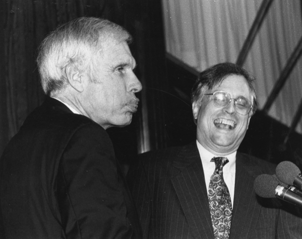 Ted Turner at the podium of the National Press Club with Club President Gil Klein