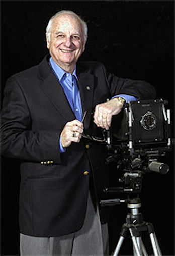 Formal shot of Marshall Cohen in a blue suit