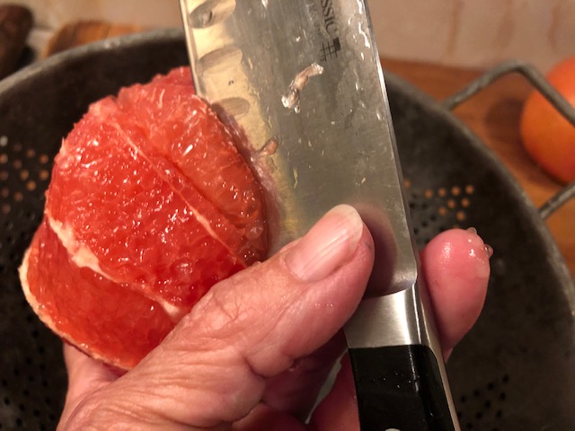 Slicing grapefruit