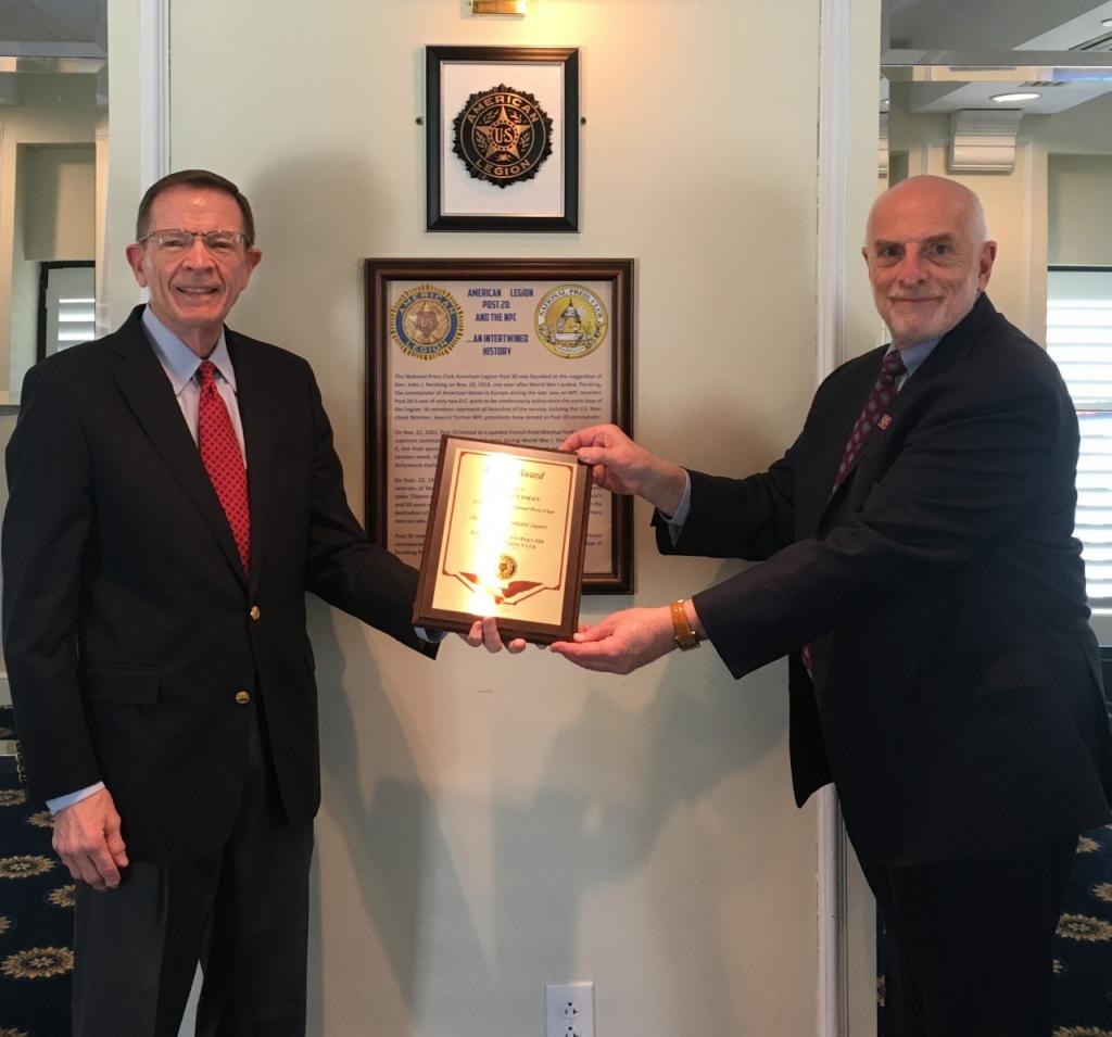 Outgoing Club President Mike Freedman accepts award from American Legion Post 20.