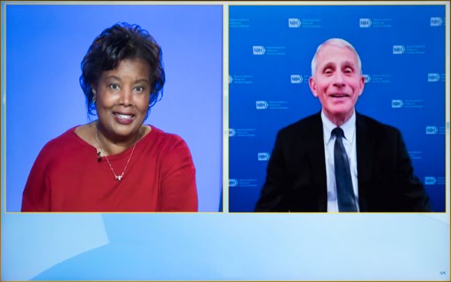 Photo of Club President Lisa Nicole Matthews interviewing Dr. Anthony Fauci.