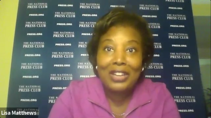Photo of Club President Lisa Nicole Matthews addressing Communicators Team.