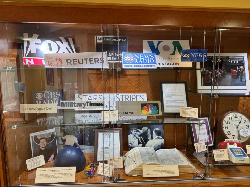 Photo of Pentagon Press Association display in NPC library