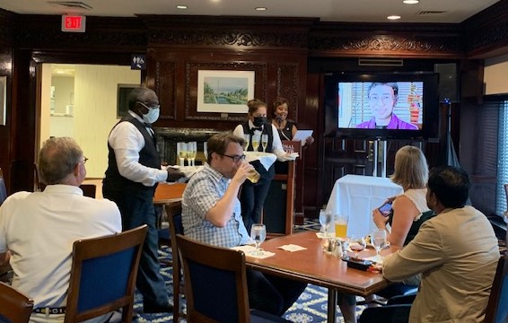 Photo of Club wait staff handing out champagne flutes